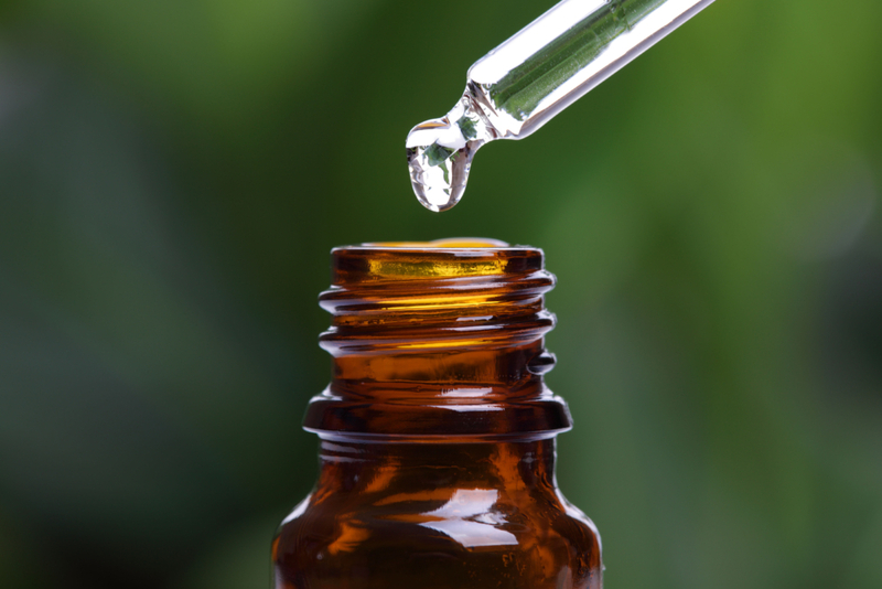 Drip Essential Oil Onto Pin Cushions | Alamy Stock Photo by Brian Jackson